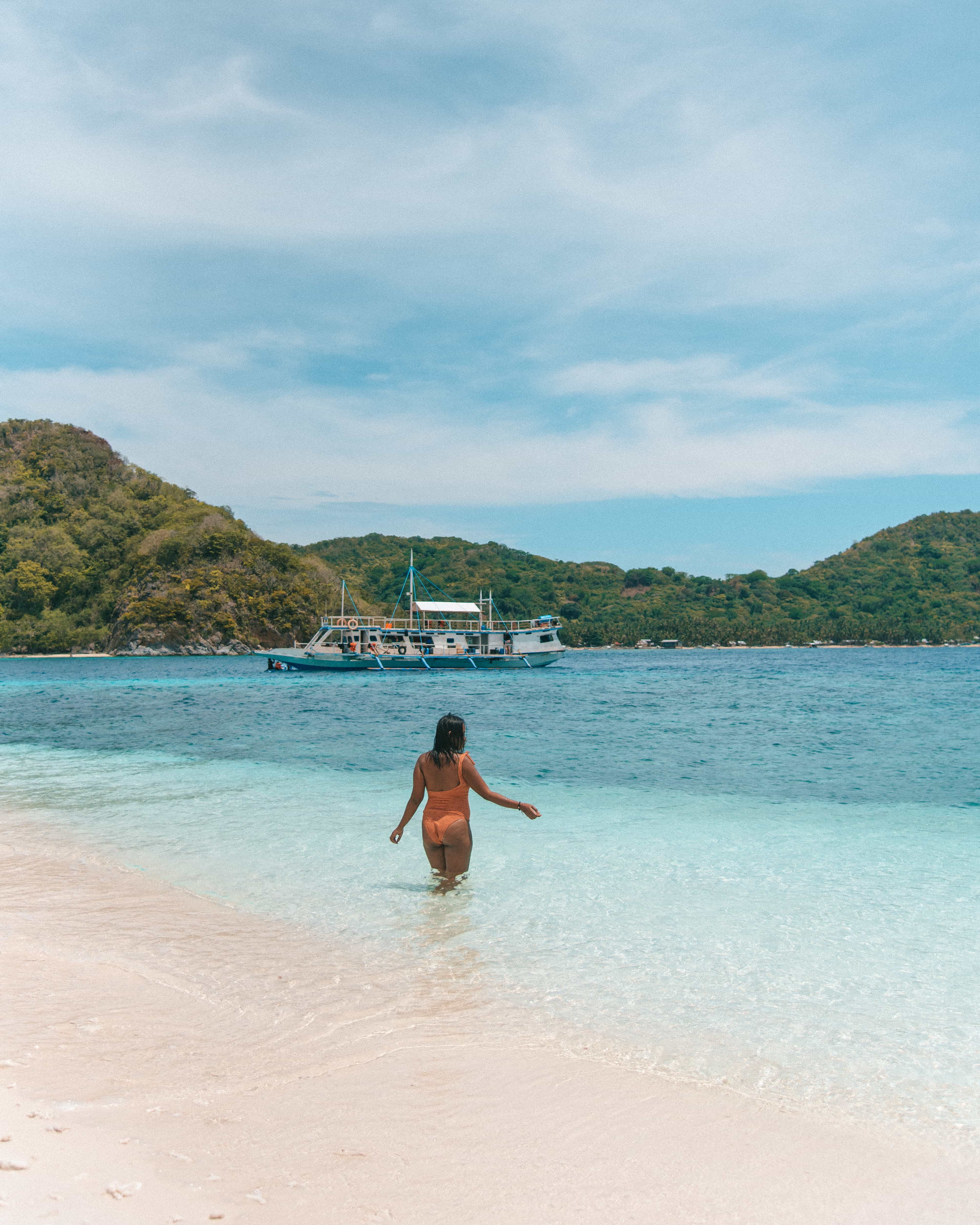 How to get from Puerto Princesa to El Nido Best Way, puerto princesa to el nido, puerto princesa to el nido by van, puerto princesa to el nido by bus, puerto princesa to el nido travel time, puerto princesa to el nido van schedule, puerto princesa airport to el nido, how far is puerto princesa to el nido, puerto princesa to el nido van fare, cheapest way from Puerto Princesa to El Nido, , el nido to coron, el nido to coron ferry, el nido to coron flight, el nido to coron fast ferry, boat from el nido to coron, ferry el nido to coron, el nido to coron island hopping, el nido to coron tour, el nido to coron expedition, Coron, Palawan itinerary, solo female travel in the Philippines