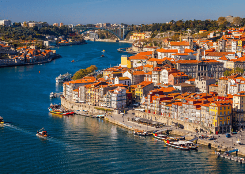 8 Best Places for Living in Europe for Less Than $2,000 USD, 10 Bucket List Destinations In Portugal To Visit, 1 Day in Porto Itinerary - One Day in Porto Itinerary - Porto, Portugal old town on the Douro River
