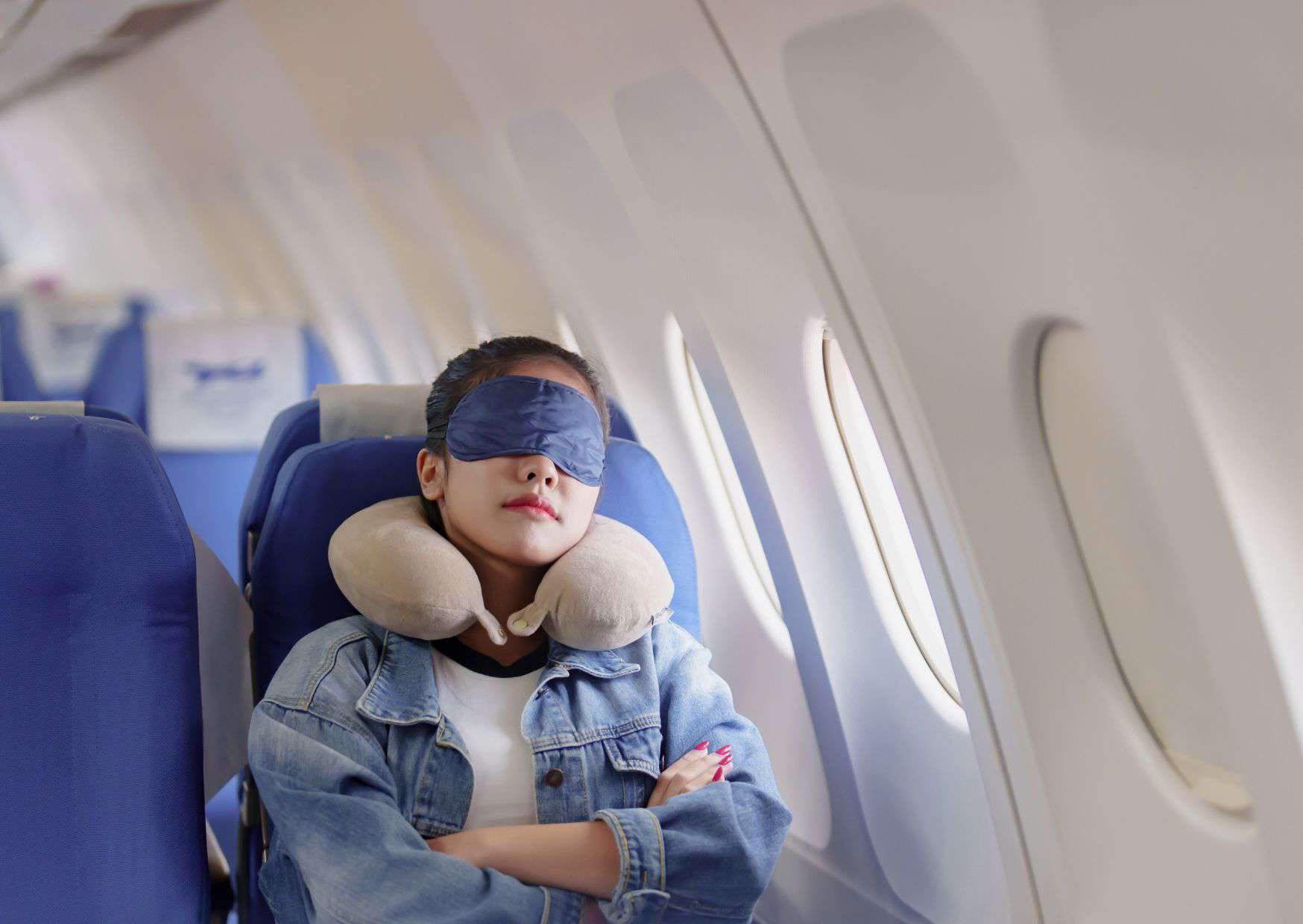 The Flight-Sleep Routine That Works Better Than Another Glass of Wine 2 Tips to Get Better Sleep on Planes and Mistakes to Avoid