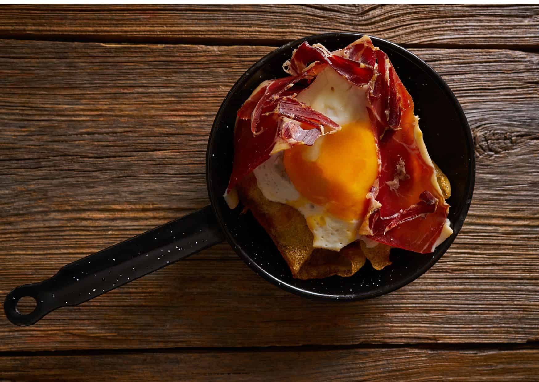 Spain For Foodies: What to Eat and Drink in Spain, How To Make Spanish Broken Eggs With Ham (Recipe Guide)